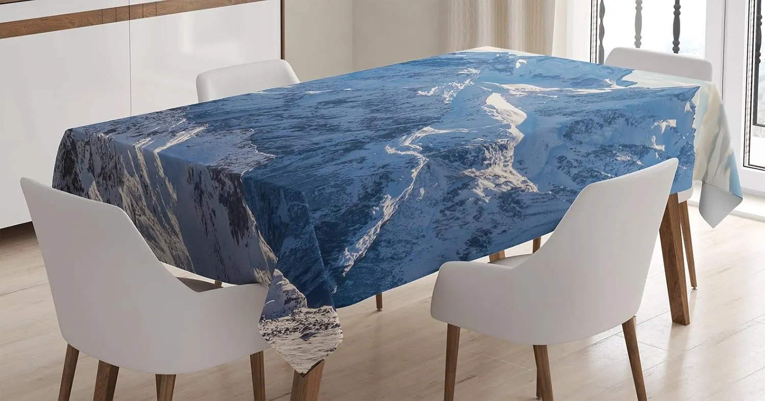 Ambesonne Mountain Tablecloth, Snowy Mountain Scene Under The Sky Winter Wilderness Untrodden Nature Print, Dining Room Kitchen Rectangular Table Cover, 52" X 70", White and Blue