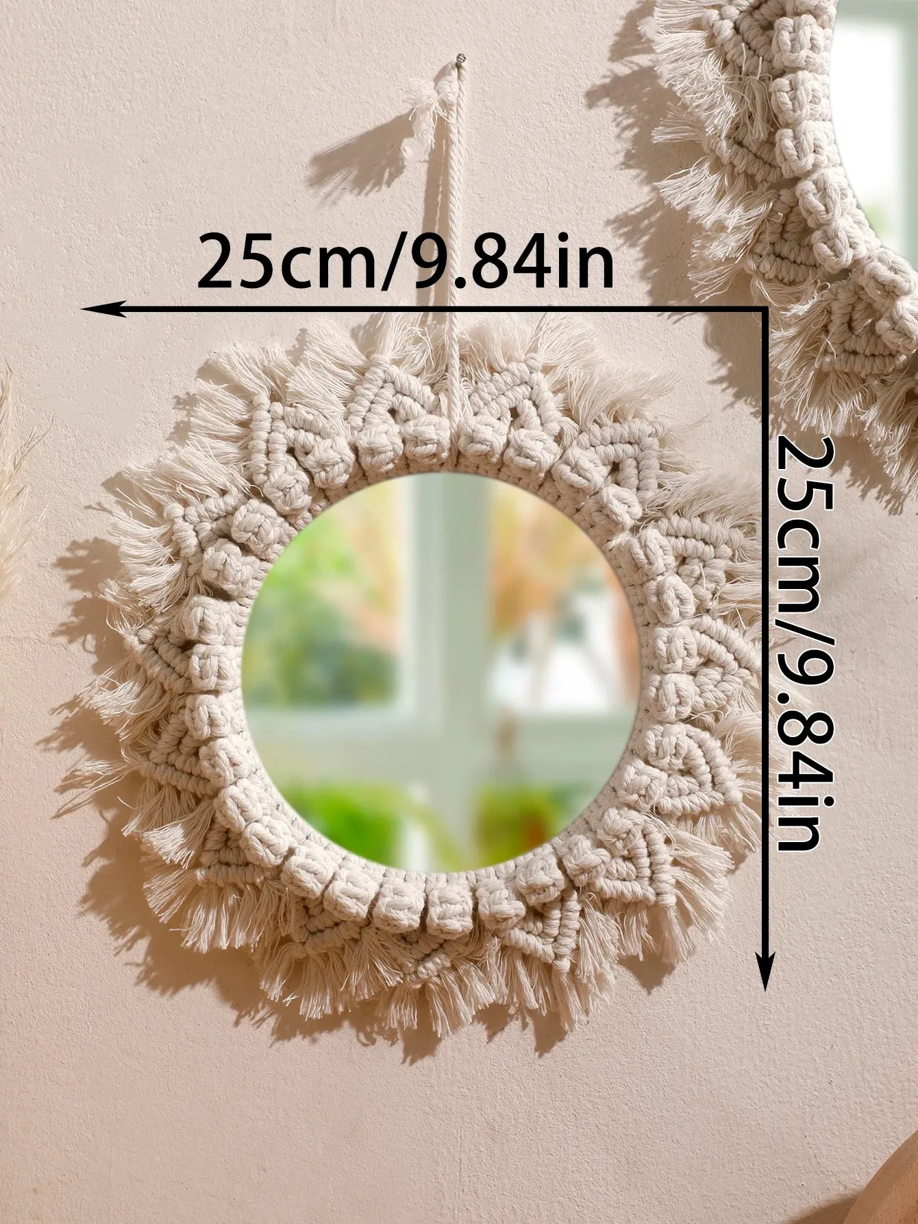 miroir suspendu en macramé décoratif avec pompons tissés